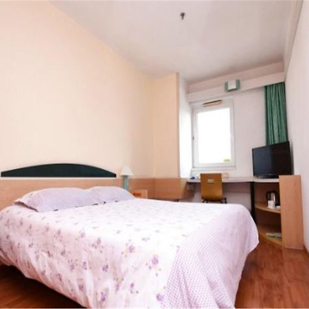 Motel Qingdao Jiaonan Renmin Road Business Street Bagian luar foto