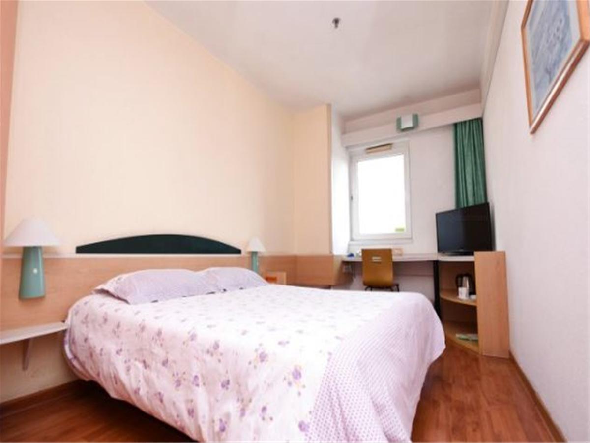 Motel Qingdao Jiaonan Renmin Road Business Street Bagian luar foto