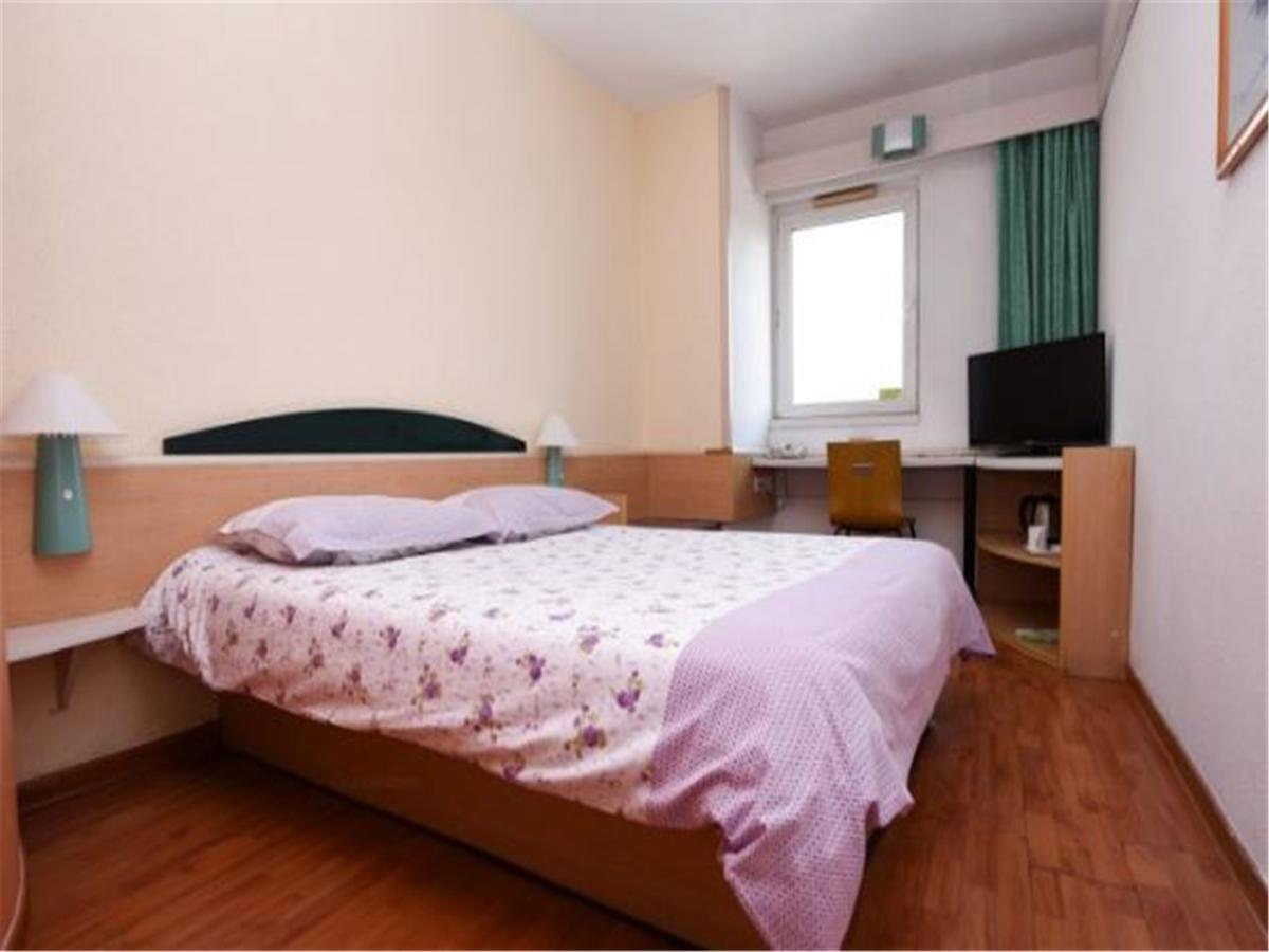 Motel Qingdao Jiaonan Renmin Road Business Street Bagian luar foto